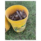 1/2 of a 5 gallon bucket rail road spikes