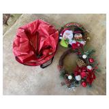 Two Christmas wreaths and bag