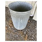 Galvanized metal trash can