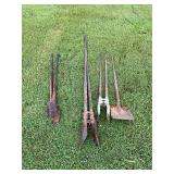 Post hole diggers and shovel