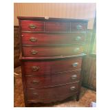 Cherry colored wood chest of drawers