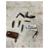 7- assorted pocket knives