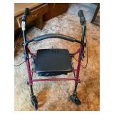 Seated mobility scooter