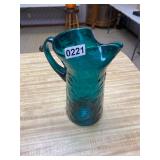 Beautiful turquoise glass pitcher