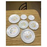 7 floral Corelle plates