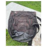 Red and black, heavy blue jean style duffel bag