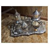 Silver platter, teapots, sugar creamer