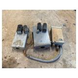 Three electrical boxes and four plugs