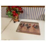 Metal rooster vase, flowers, cutting board