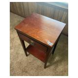 Wooden side table with drawer