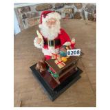Santa figure in box (box shows golfer Santa)