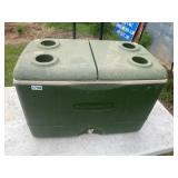 Green Rubbermaid rolling cooler