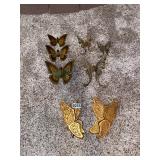 Plastic and brass butterflies ï¿½ all