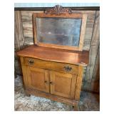Antique wood cabinet with mirror