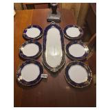 Navy and gold plates and server