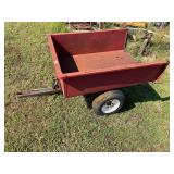 Red pneumatic tire tilting  garden cart