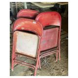 4- red metal folding chairs