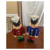 2 tinsel nutcrackers