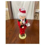 Nutcracker ï¿½ happy Santa with puppy and cookies