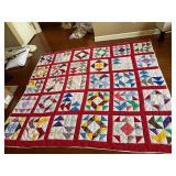 Nice patchwork quilt - red border