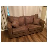Nearly new brown microsuede hide a bed couch