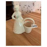 Vintage lady with basket planter