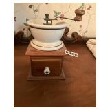 White porcelain and wood base coffee grinder