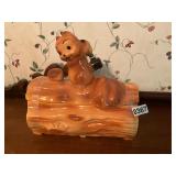 Brush McCoy squirrel on a log cookie jar