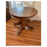Oak pedestal, rolling kitchen table