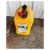 Yellow 5 gallon diesel jug