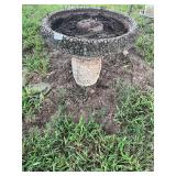 Small concrete birdbath