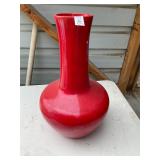 Tall, red ceramic vase