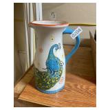 White and blue peacock ceramic pitcher