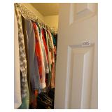 Closet of womenï¿½s clothing and shoes
