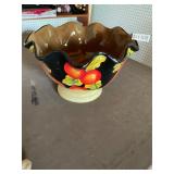 Black and fruit colored bowl