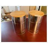 Two metal canisters with lids
