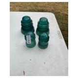 4 blue glass insulators