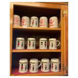 13- ceramic mugs- most are nutcracker factory