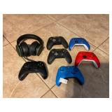 X-Box controller and headphones