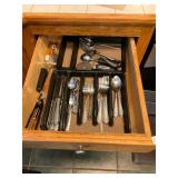 Drawer of assorted silverware