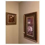 3 framed flower pictures in bathroom