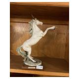 G. Armani horse statue.