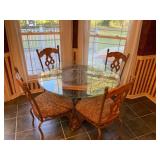 Glass top table and four chairs