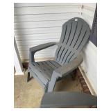 Gray plastic Adirondack chair