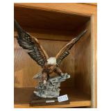 G. Armani spread eagle statue.