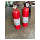 2 small charged fire extinguishers
