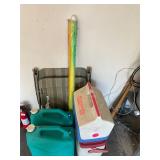Chair, water jugs, umbrella and ice chest