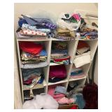 Closet full of fabric, patterns, sewing stuff