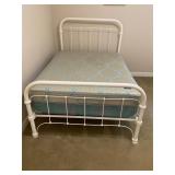 White wrought iron full size bed