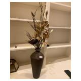 Brown tall vase with greenery